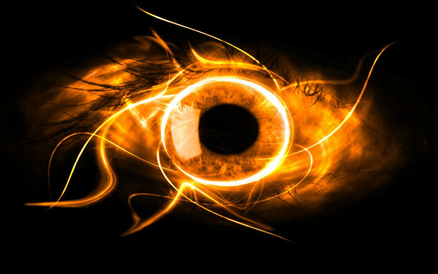 Bright orange eyeball black background free wallpaper for desktop - medium preview image