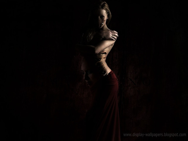 Woman long dress posing dark free wallpaper for desktop - medium preview image