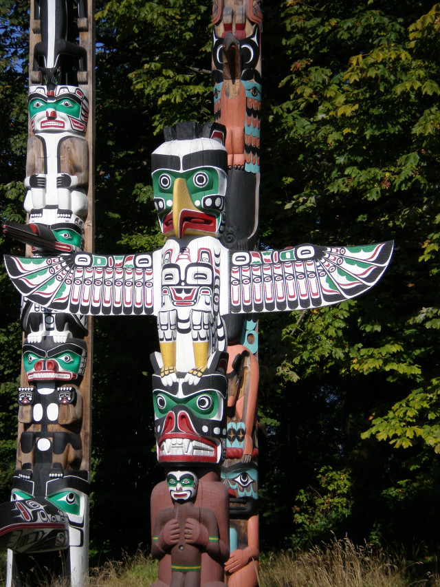 Totem statue forest trees bushes free wallpaper for mobile - medium preview image