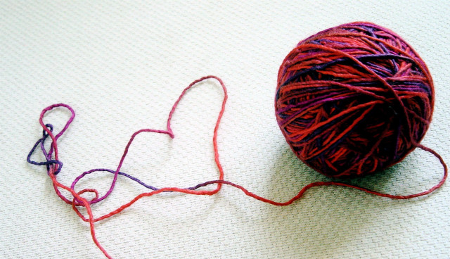 Yarn ball white surface red free wallpaper for desktop - medium preview image