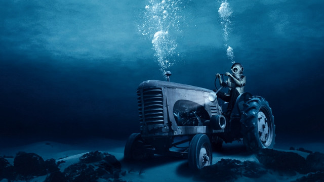 Tractor underwater ocean rocks bubbles free wallpaper for desktop - medium preview image