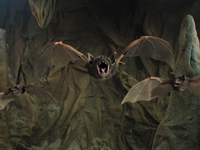 Bats rocky cave matte painting free wallpaper for desktop - medium preview image