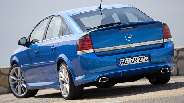 Blue car parked road stone free wallpaper for desktop - medium preview image