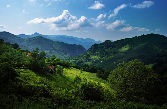 Lush green hillside house mountains free wallpaper for desktop - medium preview image