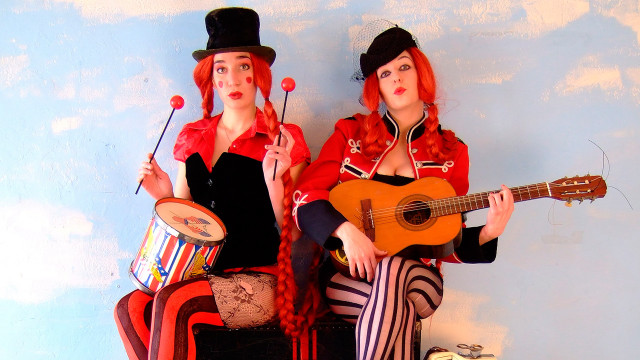 Costumed women guitars drums sitting free wallpaper for desktop - medium preview image