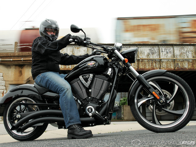 Man motorcycle street bridge train free wallpaper for desktop - medium preview image