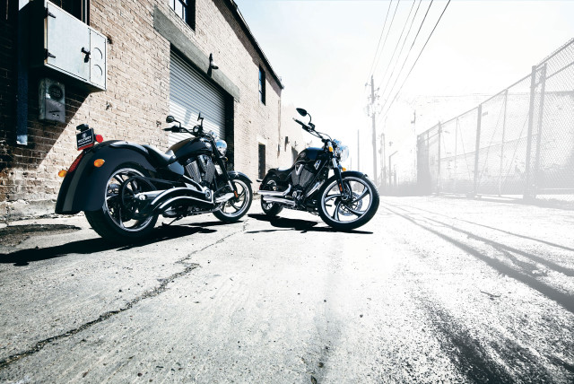 Two motorcycles street building fence free wallpaper for desktop - medium preview image