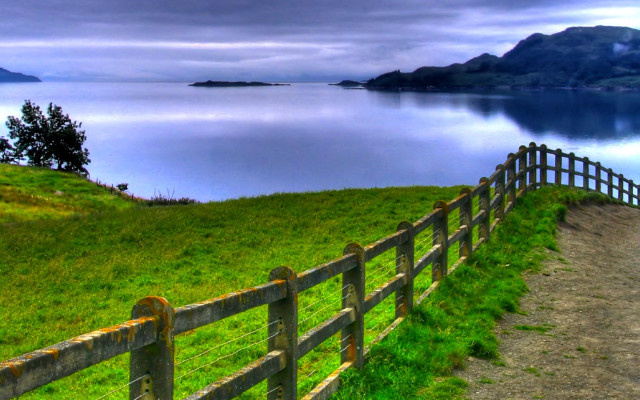 Wooden fence grassy hill lake #2 free wallpaper for desktop - medium preview image