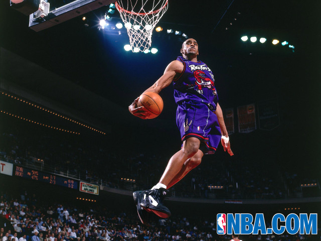 Man purple uniform dunking basketball #3 free wallpaper for desktop - medium preview image