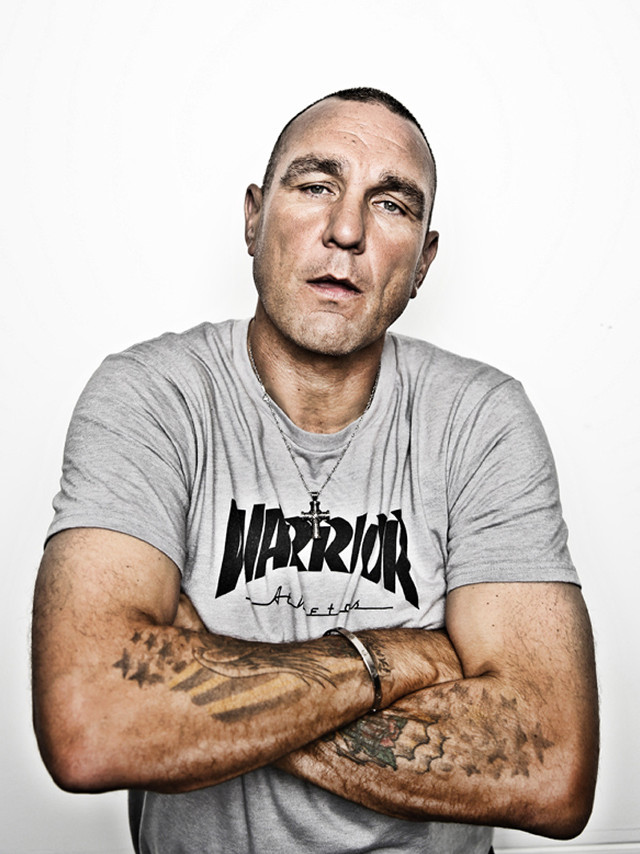 Tattooed man posing arms crossed free wallpaper for mobile - medium preview image