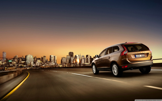 Brown car highway city skyline free wallpaper for desktop - medium preview image