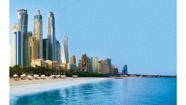 Beach chairs umbrellas sand city free wallpaper for desktop - medium preview image