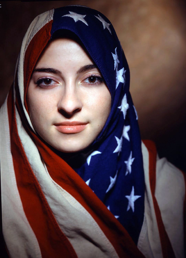 Woman with scarf flag looking free wallpaper for mobile - medium preview image