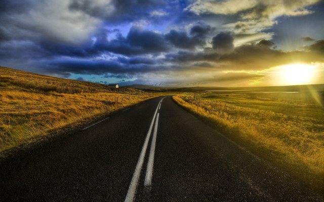 Clouds sunshine road grassy landscape free wallpaper for desktop - medium preview image