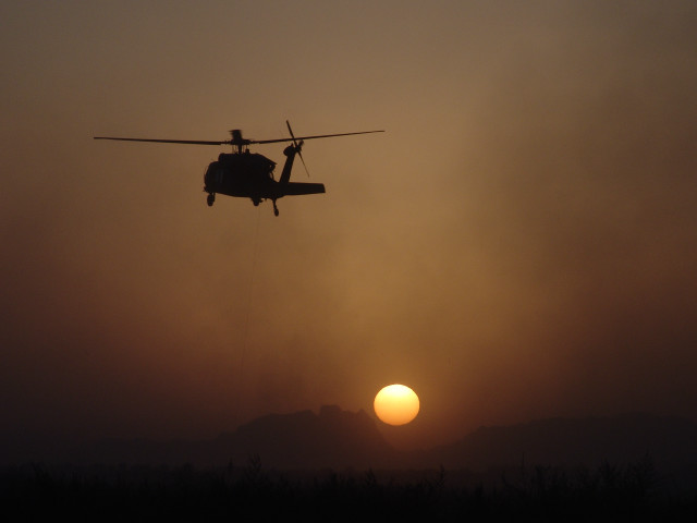 Helicopter sunset mountain flying sky free wallpaper for desktop - medium preview image