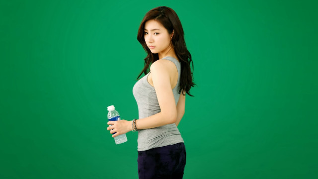 Woman holding water bottle cell free wallpaper for desktop - medium preview image