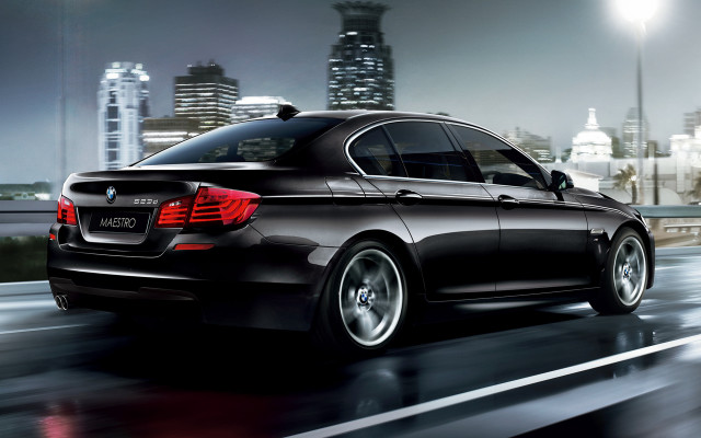 Black car city street night free wallpaper for desktop - medium preview image