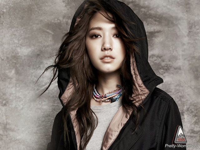 Woman hoodie pose gray background free wallpaper for desktop - medium preview image