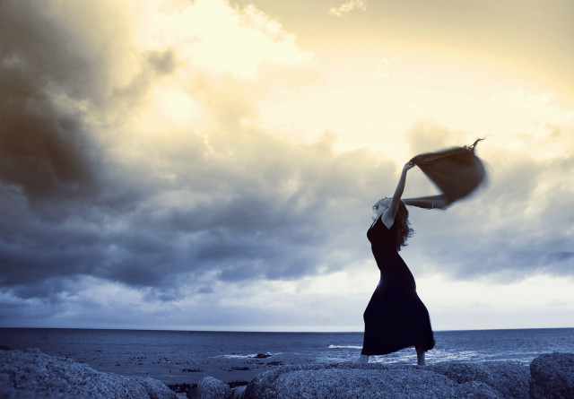 Woman rock umbrella cloudy sky free wallpaper for desktop - medium preview image