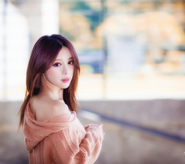 Woman pink sweater posing picture free wallpaper for tablet - medium preview image