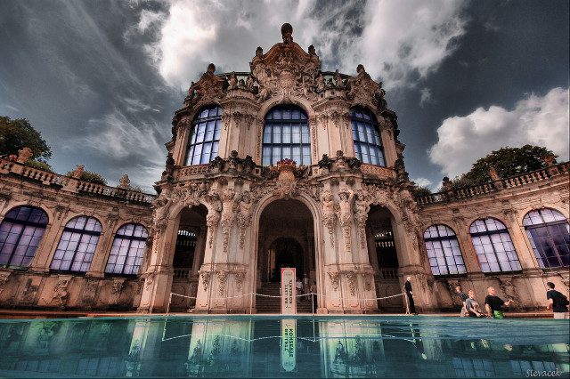 Large building pool cloudy sky free wallpaper for desktop - medium preview image