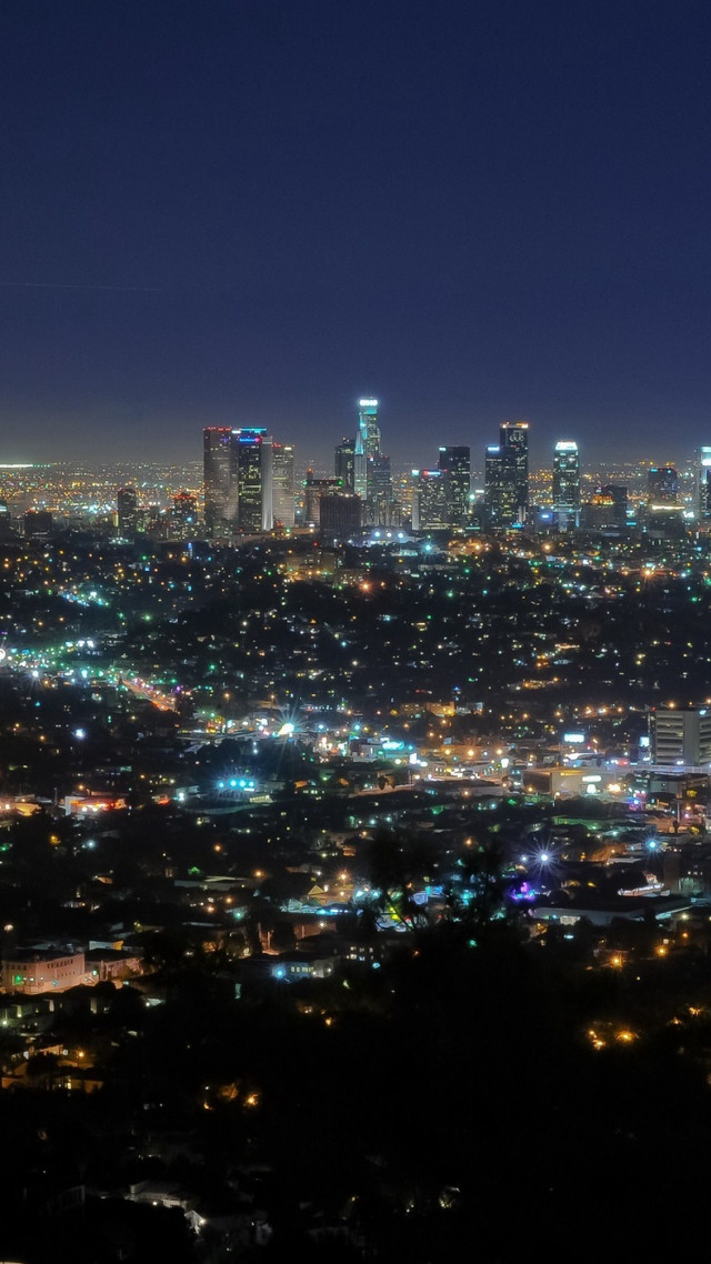 City skyline night lights plane free wallpaper for mobile - medium preview image