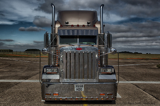 Semi truck runway cloudy sky free wallpaper for desktop - medium preview image