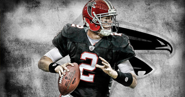 Football player holding ball wearing free wallpaper for desktop - medium preview image