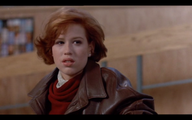 Woman brown jacket red sweater free wallpaper for desktop - medium preview image