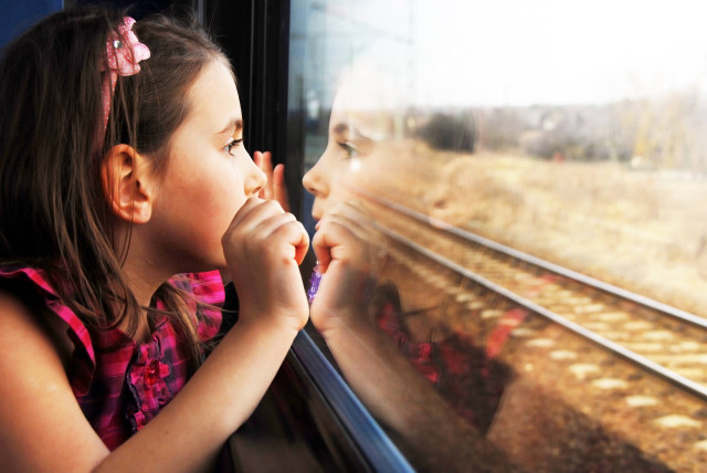 Little girl train window passing free wallpaper for desktop - medium preview image
