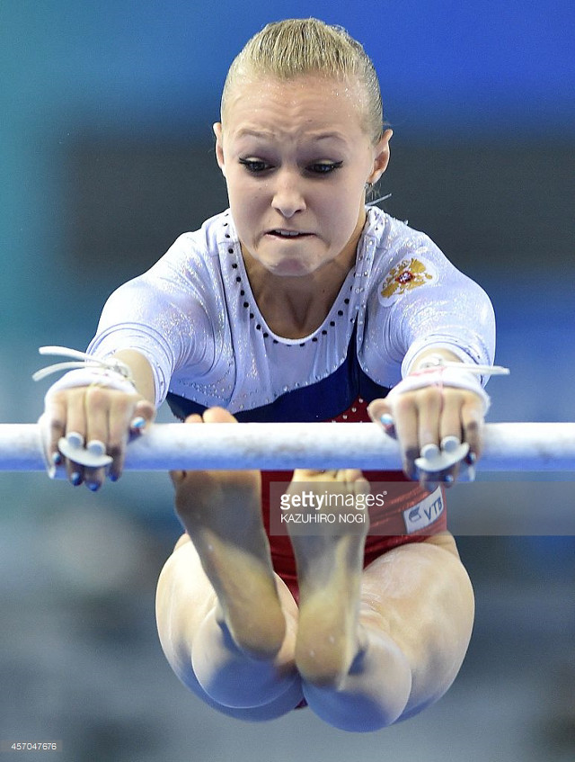 Olympic gymnastics unevenbars elina karimova free wallpaper for mobile - medium preview image