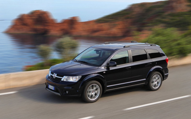 Black suv ocean road cliff free wallpaper for desktop - medium preview image