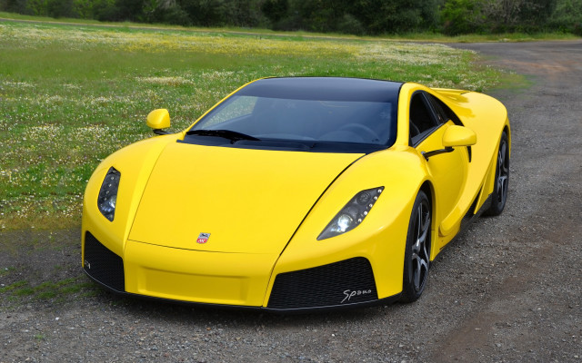 Yellow sports car gravel road free wallpaper for desktop - medium preview image