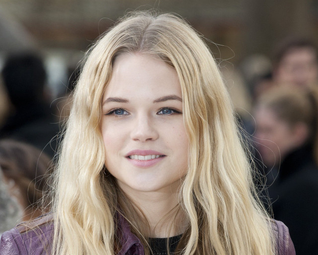 Blonde woman smiling blue eyes free wallpaper for desktop - medium preview image