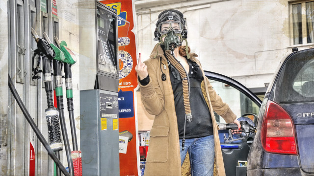 Man mask gas pump car free wallpaper for desktop - medium preview image