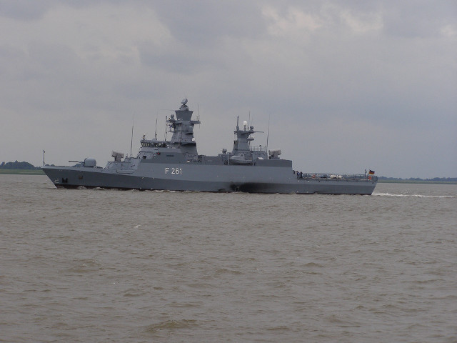 Battleship shoreline boat cloudy sky free wallpaper for desktop - medium preview image
