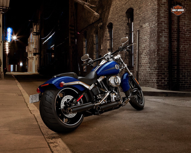 Blue motorcycle parked road building free wallpaper for desktop - medium preview image