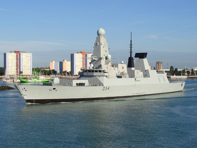 Military ship sailing water city free wallpaper for desktop - medium preview image