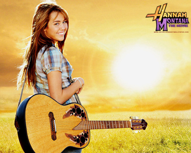 Girl holding guitar field grass free wallpaper for desktop - medium preview image