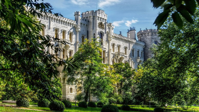 Castle clock tower trees bench free wallpaper for desktop - medium preview image