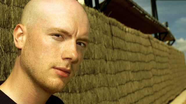 Bald man straw roof sky free wallpaper for desktop - medium preview image