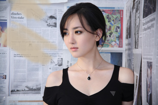 Woman black top wall newspapers free wallpaper for desktop - medium preview image