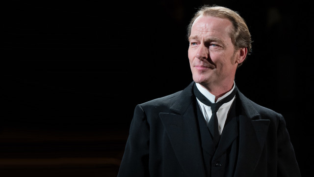 Man suit tie looking side free wallpaper for desktop - medium preview image