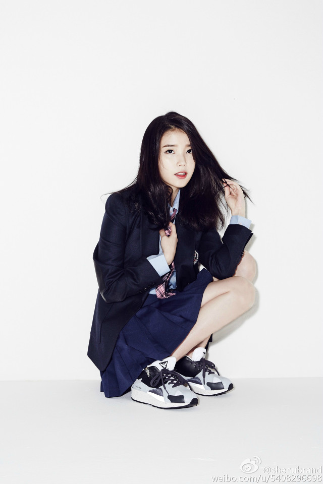 Woman suit crossed legs blue free wallpaper for mobile - medium preview image