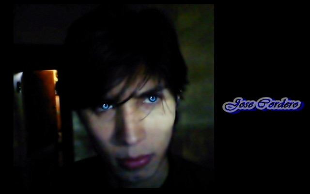 Man blue eyes cell phone free wallpaper for desktop - medium preview image