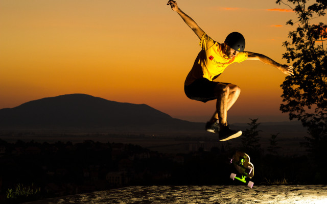 Man flying skateboard sunset park free wallpaper for desktop - medium preview image