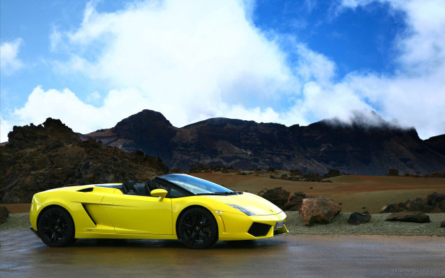 Yellow sports car mountain range free wallpaper for desktop - medium preview image