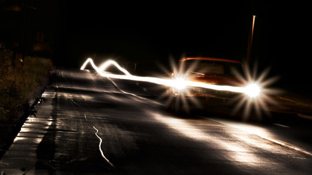 Car night street headlights shining free wallpaper for desktop - medium preview image