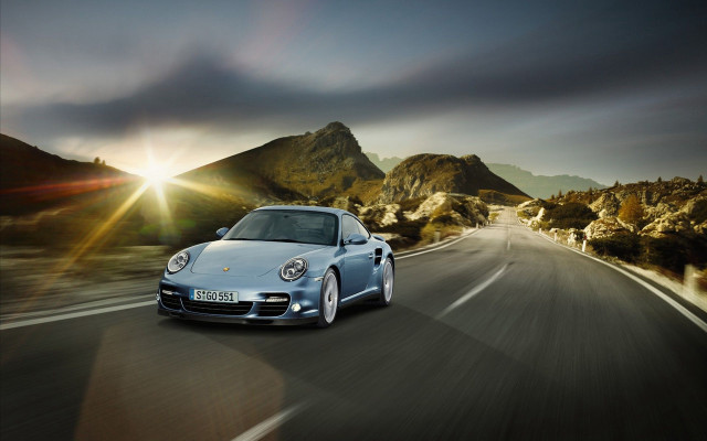 Silver porsche driving road mountains free wallpaper for desktop - medium preview image