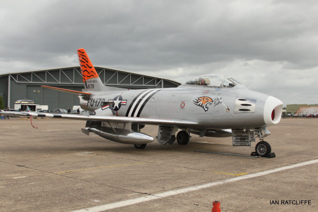 Silver fighter jet airport tarmac free wallpaper for desktop - medium preview image